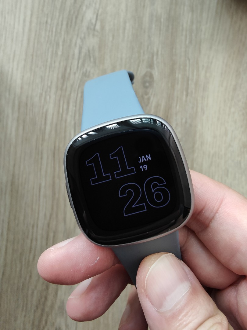 Fitbit Versa 4 smartwatch in Waterfall Blue / Platinum Aluminum