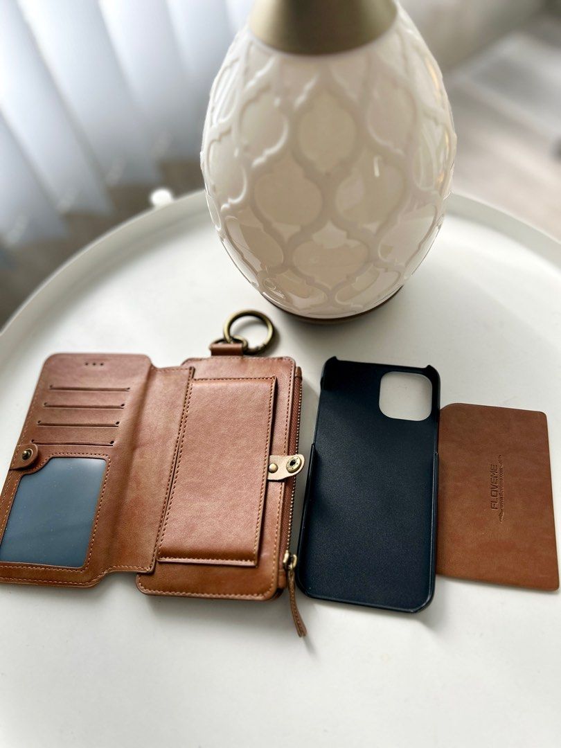 Iphone 12 pro leather case wallet (Category: Wallets & Card holders) located in Quezon City. Submitted by mythingsforless (Listing ID 1210479943, Image 3). Description: Made of prime genuine soft leather, comfortable hand feeling and durable quality. Can be used as phone purse, wallet purse. Dual zipped pockets. Spacious room with zip closure can securely hold iphone, money, cards, wallet, tickets, and classify your personal stuff /small items. F