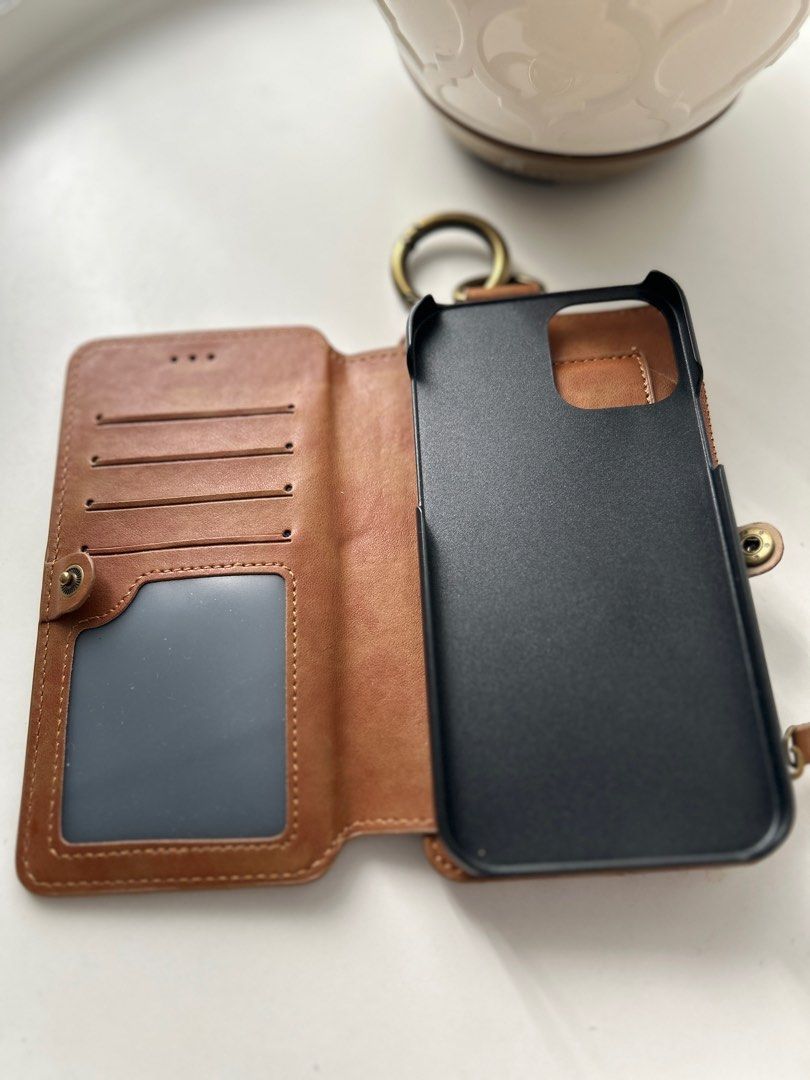 Iphone 12 pro leather case wallet (Category: Wallets & Card holders) located in Quezon City. Submitted by mythingsforless (Listing ID 1210479943, Image 2). Description: Made of prime genuine soft leather, comfortable hand feeling and durable quality. Can be used as phone purse, wallet purse. Dual zipped pockets. Spacious room with zip closure can securely hold iphone, money, cards, wallet, tickets, and classify your personal stuff /small items. F
