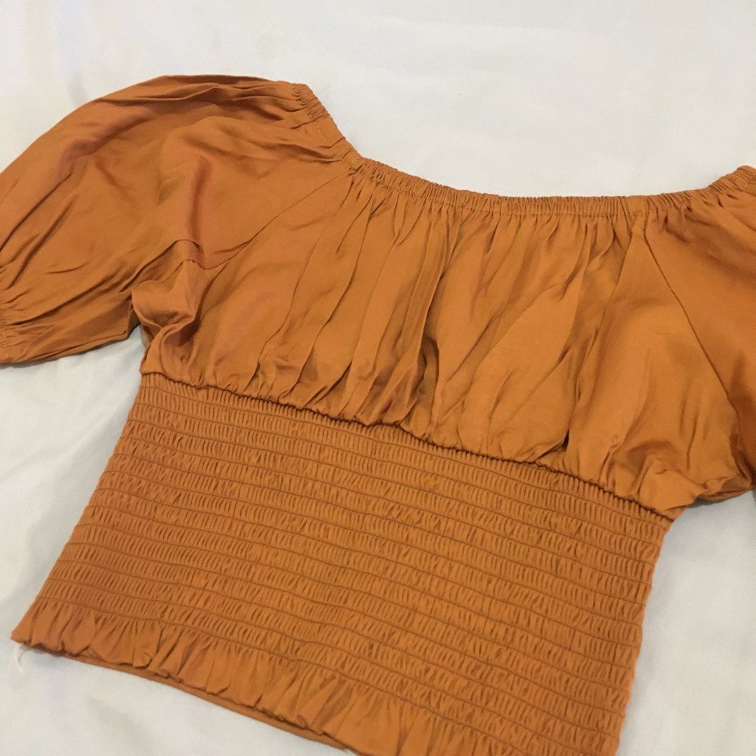 Korean puff sleeve top (rust) (Category: Blouses) located in Caloocan City. Submitted by nadicart (Listing ID 1210466532, Image 2). Description: Size: Small Color Available: Rust Personal fave! No flaws.