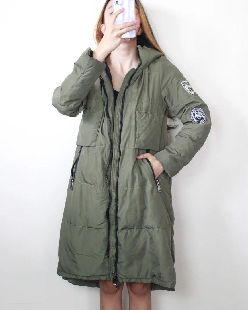 Coat with patch 2025 on left arm