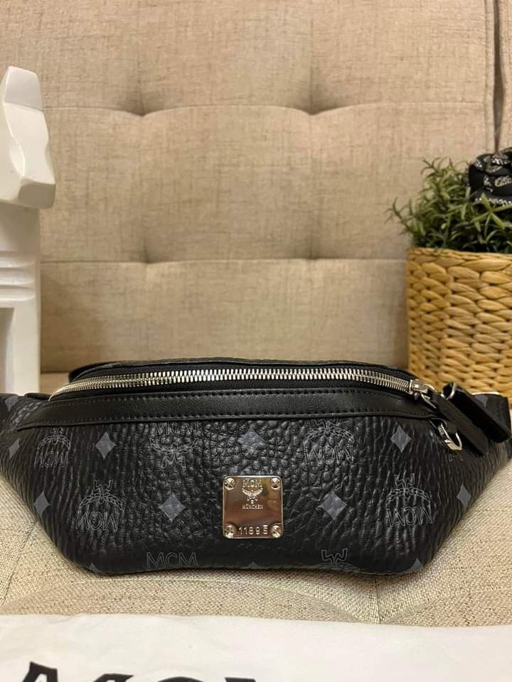 MCM Beltbag Black (Category: Luxury Bags & Wallets) located in Manila. Submitted by bagislifeshop (Listing ID 1210545623, Image 2). Description: Unisex!!! 😍😍😍 On Hand in PH 🇵🇭 100% Authentic MCM Beltbag Black Condition: 9/10 Comes with Dustbag.