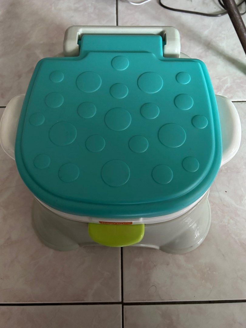 Potty Trainer with sounds (Category: Toilet Training) located in Manila. Submitted by sofiatanya (Listing ID 1210436286, Image 1). Description: Never pa nagamit. Ayaw talaga ng anak ko gamitin. Tumutunog siya tuwing may pupu at wiwi lalagyan lang ng battery. Original price is 1800. Loc: Tondo.