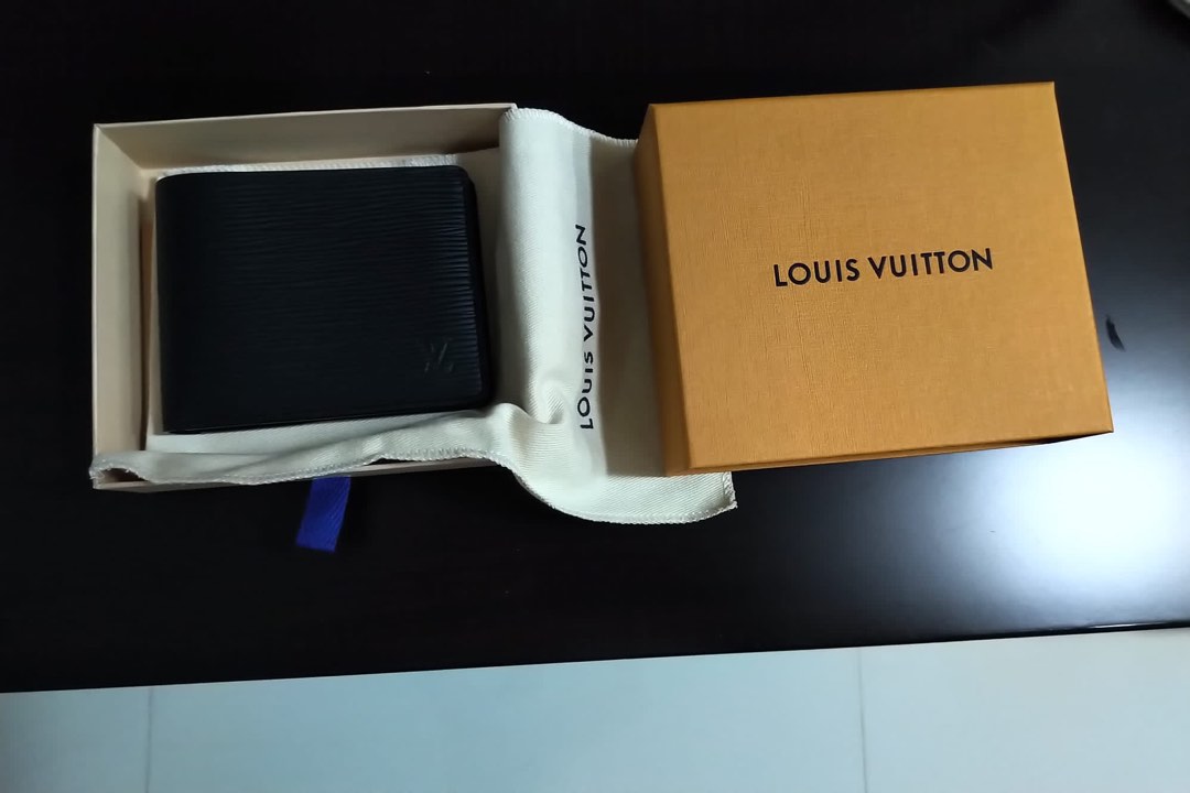 Louis Vuitton full leather slender wallet M60339 (Black), Luxury, Bags &  Wallets on Carousell