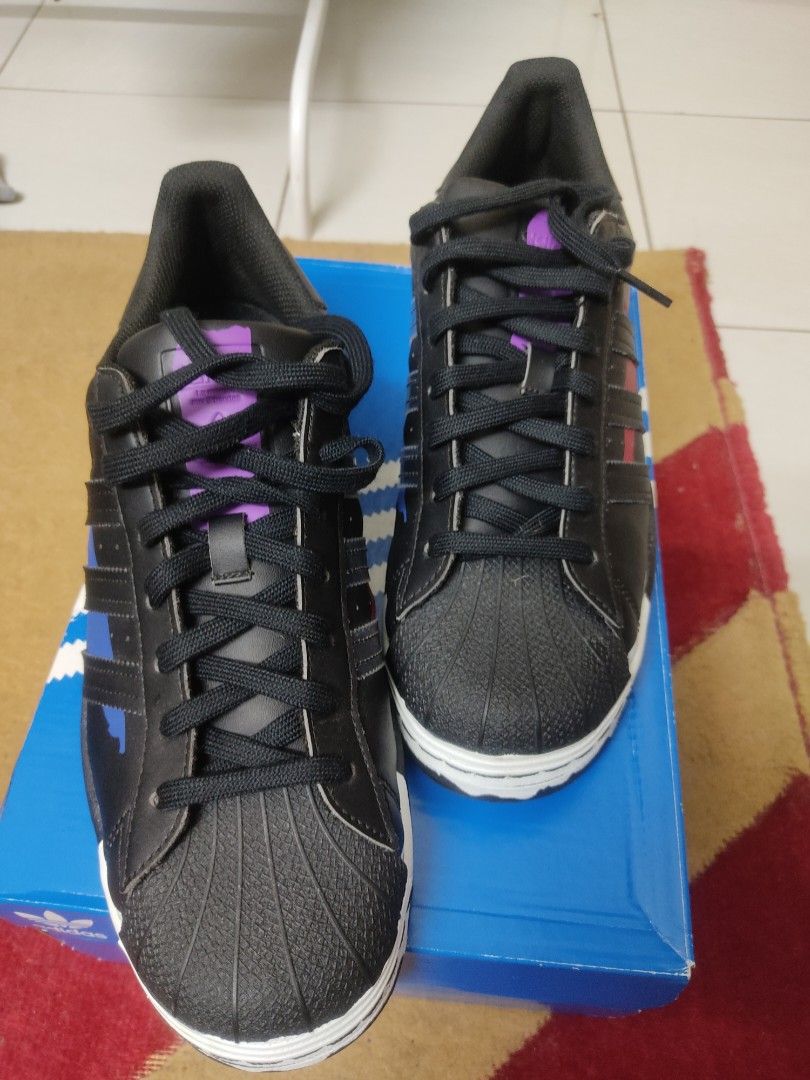 Black adidas with holographic stripes clearance