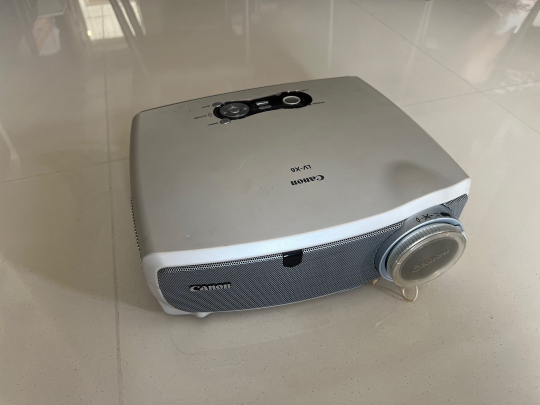Canon LV-WX320 Projector with Wall Mount holder, Mobile Phones & Gadgets,  Mobile & Gadget Accessories, Mounts & Holders on Carousell