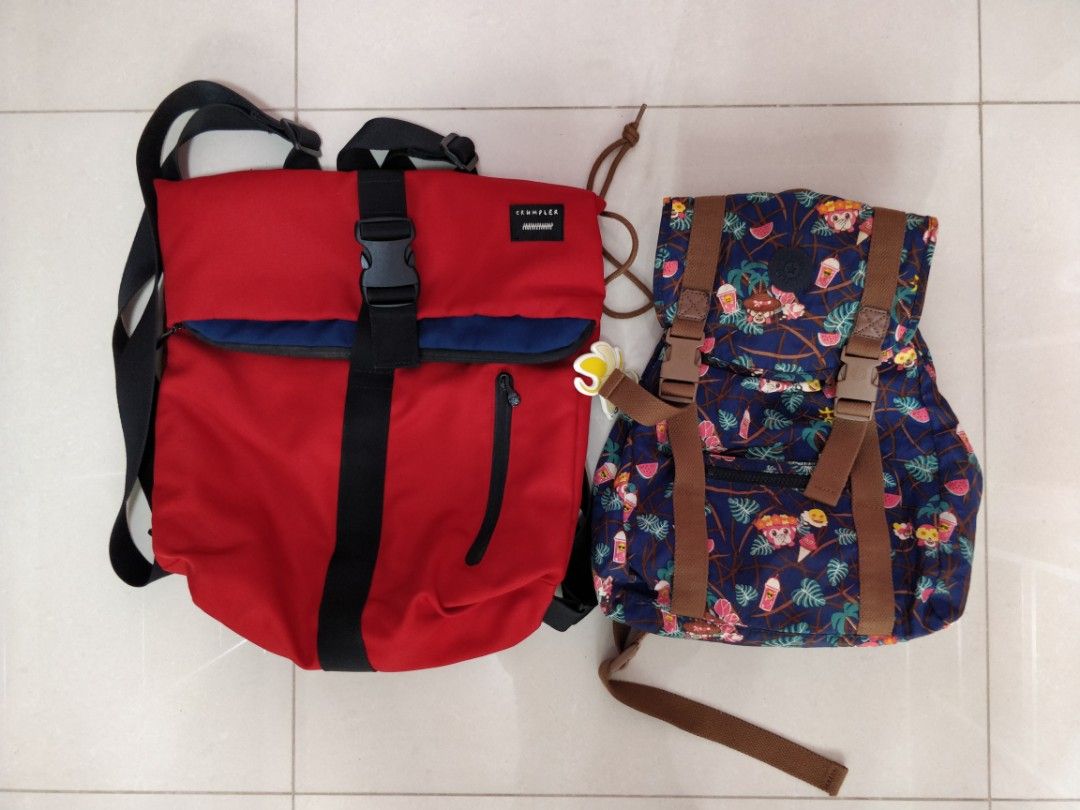 Crumpler red rucksack backpack and Kipling x emoji backpack, Women's ...