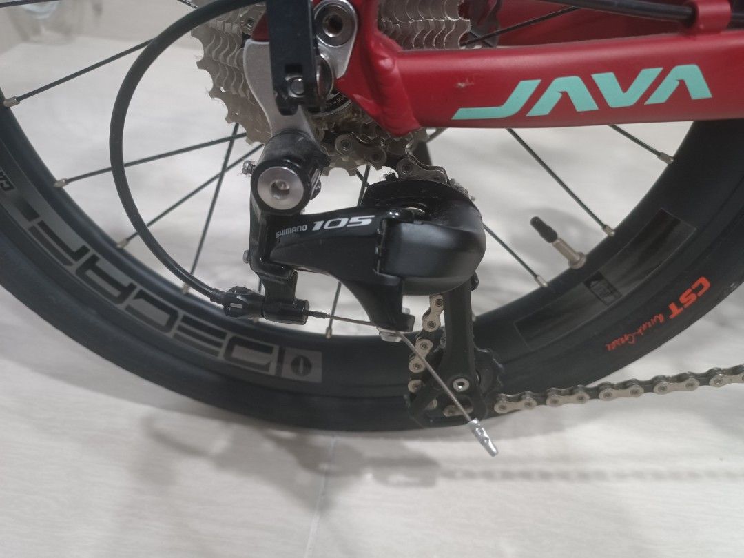 Java neo 2 (Category: Bicycles) located in Singapore. Submitted by clarence_raj (Listing ID 1207076418, Image 3). Description: seldom used. taking space. decide to sell if the offer is right. lots of upgrades. Shimano 105, Shimano brakes. lite pro carbon handle, matching red oury hand grips, Shimano alum pedal and lots more. bike has been serviced, have additional rubber bushing as well.