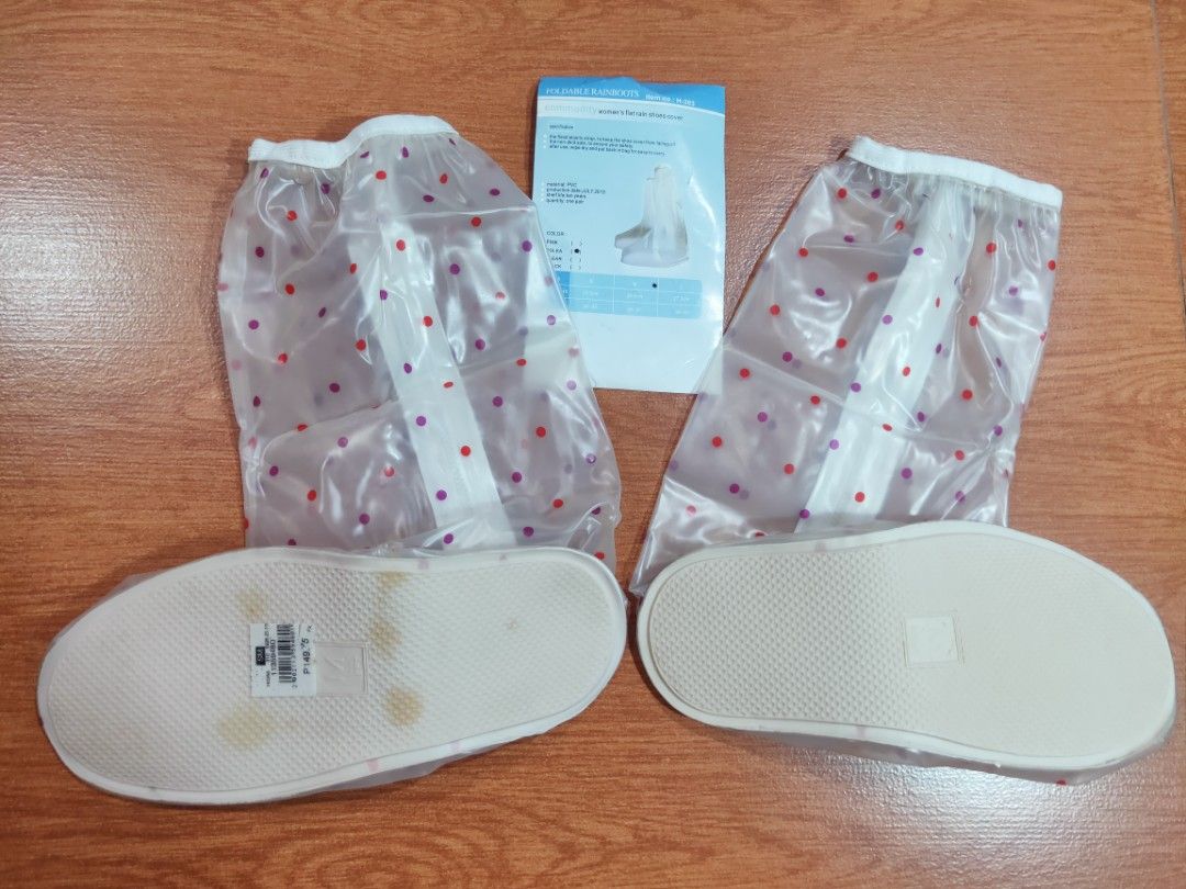 Foldable Rainboots (Category: Boots) located in Makati City. Submitted by lishey (Listing ID 1207155899, Image 2). Description: Foldable Rainboots Women's Flat Shoes Rain Cover Brand New. Never been used. Polka Dot Design Material: PVC Shoe Size: Medium Sole Length: 26.5cm Yard: 36-37 Has Fixed elastic strap, to keep the shoe cover from falling off Has non-skid sole, to ensure your safety After use, wipe dry and put back in bag for easy to carry 
