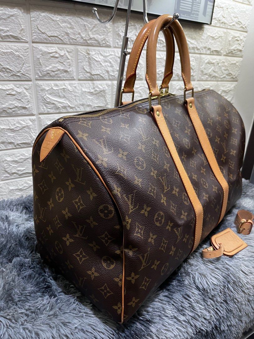 LV Keepall 45 Year 2000 (Category: Luxury Bags & Wallets) located in Quezon City. Submitted by christineboller (Listing ID 1207068248, Image 2). Description: Louis Vuitton Keepall 45. In 9.5/10 condition (pristine, fresh patina) and clean interior. Serial No. FL0040 (Year 2000). Comes in set of bag tag and buckle for only P44k. .