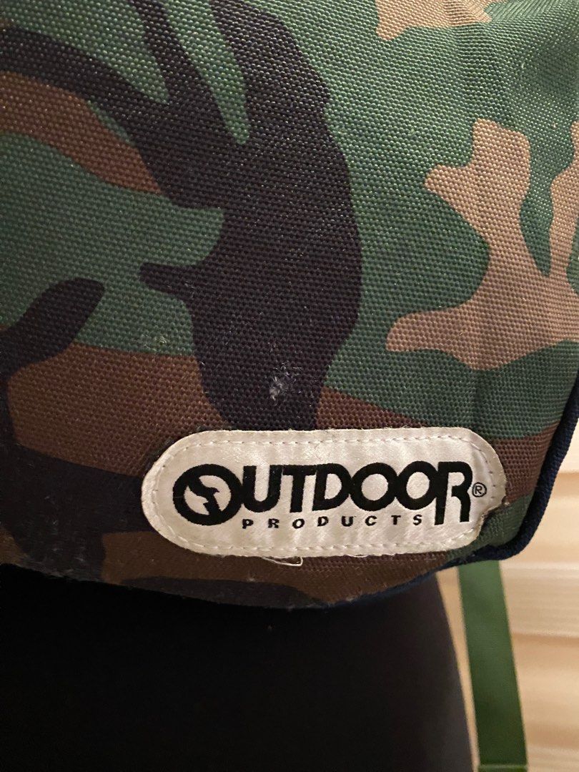 Outdoor Backpack (Category: Backpacks) located in Quezon City. Submitted by prelovedbagsbygiv (Listing ID 1207110285, Image 3). Description: Brand: Outdoor Products Bag type: Backpack Color: blue and camo Material: Nylon Size: Height: 15 in. Length: 11 in. Width: 5 in. In good condition Zipper closure Minimal sign of usage inside .