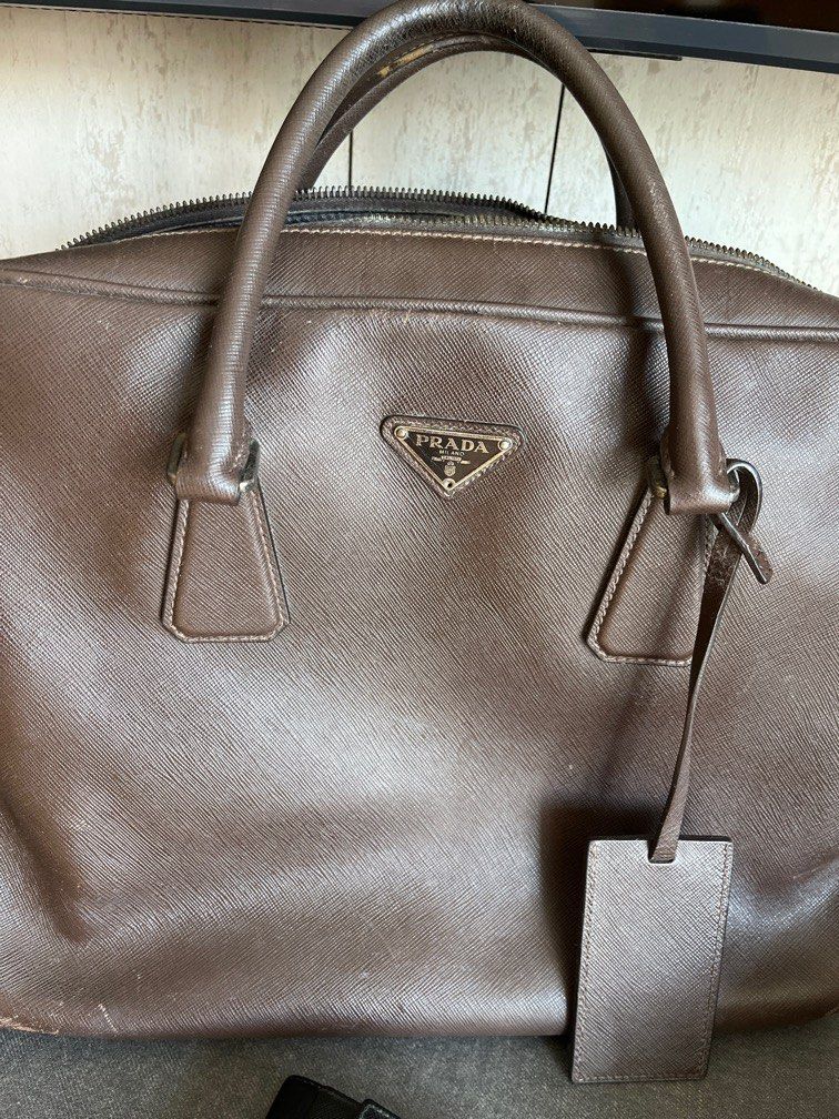 Prada Briefcase bag (Category: Bags & Wallets) located in Singapore. Submitted by ronsonzhang (Listing ID 1206956735, Image 1). Description: Bought from Milan, Italy at $2500 Euro No Sling.