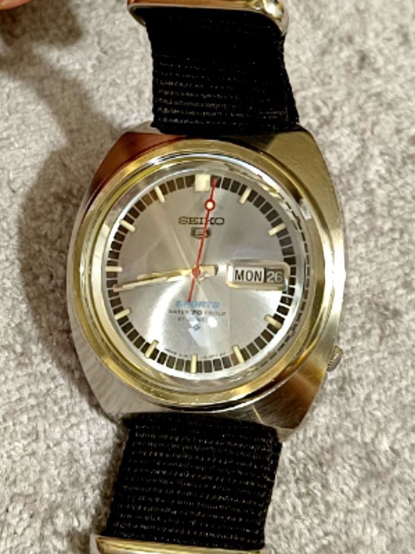 Seiko 6119-8130 Rare Silver Dial Automatic Watch SRPK17K (Category: Watches) located in Singapore. Submitted by relax98 (Listing ID 1207098460, Image 3). Description: Very rare silver dial in good condition (cosmetic 9/10, clean dial, hands and non scratch glass. Minor hairline on bezel and case) Working 10/10 keeping good time+-15 sec/day and calendar works as it should. Ready to wear watch only with black Nato fabric strap..