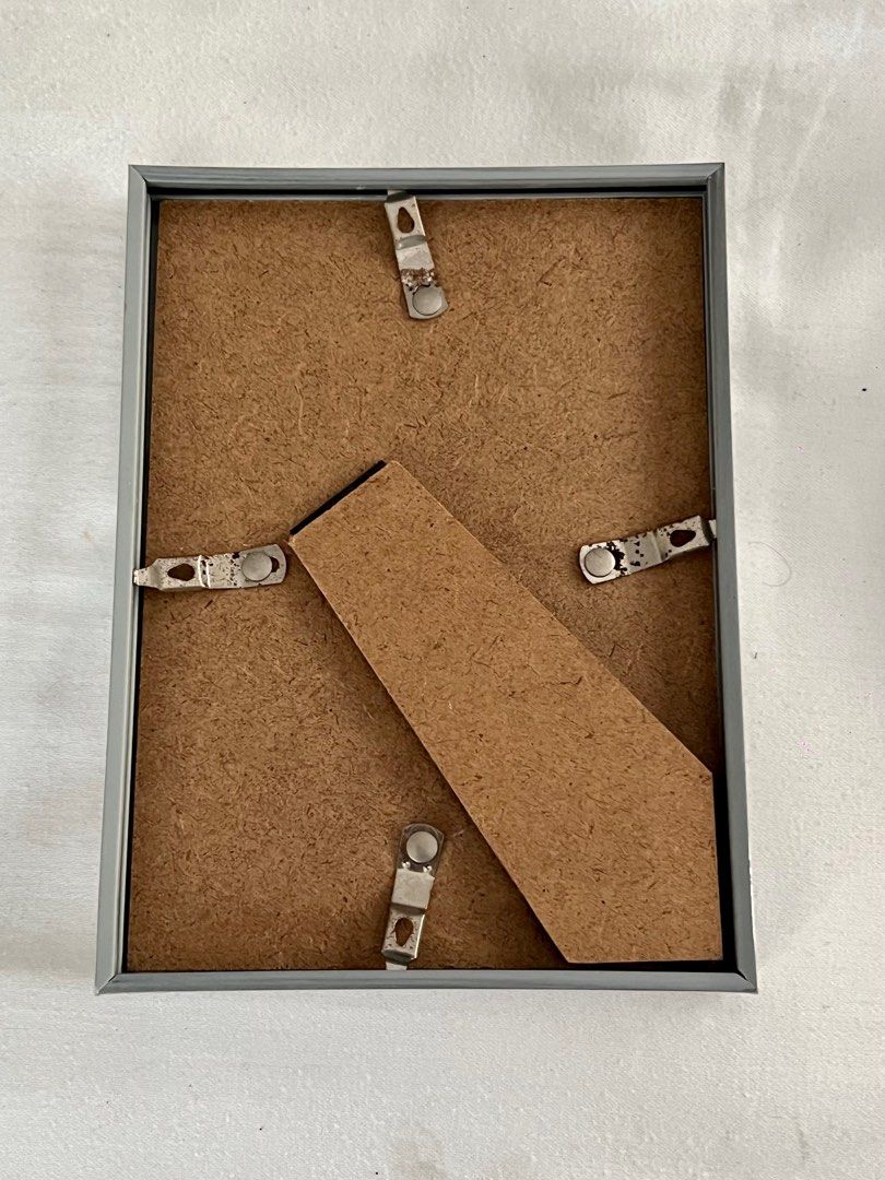 Silver lining picture frame (Category: Frames & Pictures) located in Makati City. Submitted by VersatileBabe (Listing ID 1207040280, Image 2). Description: Length: 5.3 inches Height: 7.2 inches.