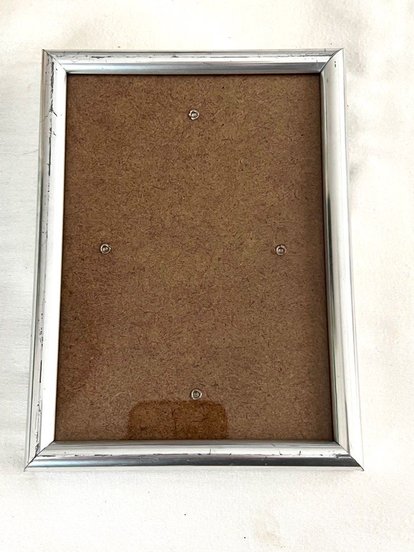 Silver lining picture frame (Category: Frames & Pictures) located in Makati City. Submitted by VersatileBabe (Listing ID 1207040280, Image 1). Description: Length: 5.3 inches Height: 7.2 inches.