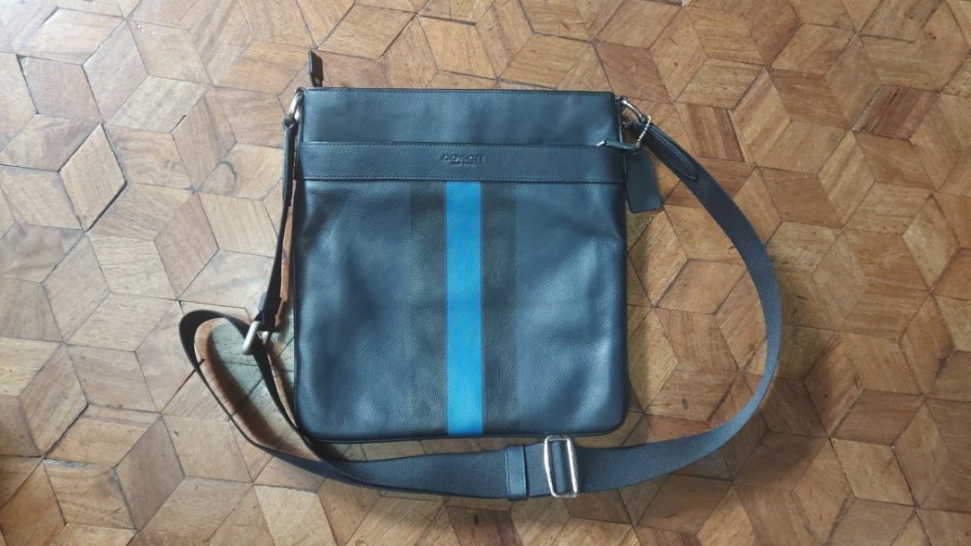 Coach - Charles Crossbody Leather Bag (Category: Sling Bags) located in Paranaque City. Submitted by d4n13ll3 (Listing ID 1210652841, Image 1). Description: New and never used, hardware and leather in good condition. Details: Crossgrain leather Inside zip and multifunction pockets Zip-top closure, fabric lining Outside open and zip pockets Adjustable strap for shoulder or crossbody wear 11 1/2" (L) x 11" (H) x 1 1/4" (W) Authentic.