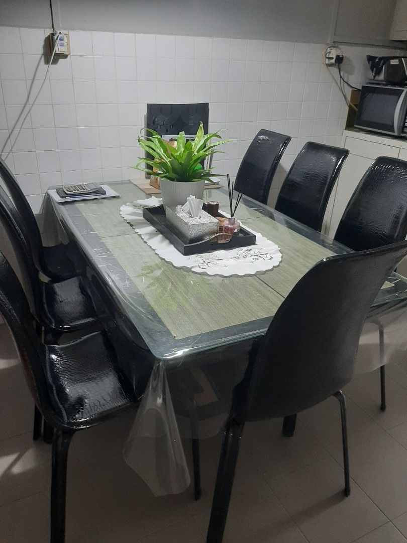 Dining Table (Category: Tables & Sets) located in Singapore. Submitted by nora_r (Listing ID 1210642232, Image 1). Description: Marble dining table with glass top. It will also comes with the chairs. Hardly use and very well maintain. Plastic cover is used to prevent scratch on the glass top. Selling due to house reno and price is negotiable. Measurement - 160L×90W×75H.