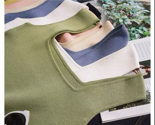 Green sweater like top and denim skirt