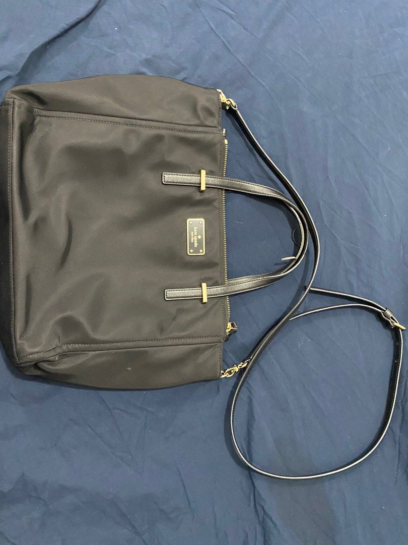 Kate spade 2 way nylon tote bag (Category: Luxury Bags & Wallets) located in Taguig. Submitted by wdpdln (Listing ID 1210691997, Image 1). Description: Only issue is the short handle Otherwise bag is actually barely used .