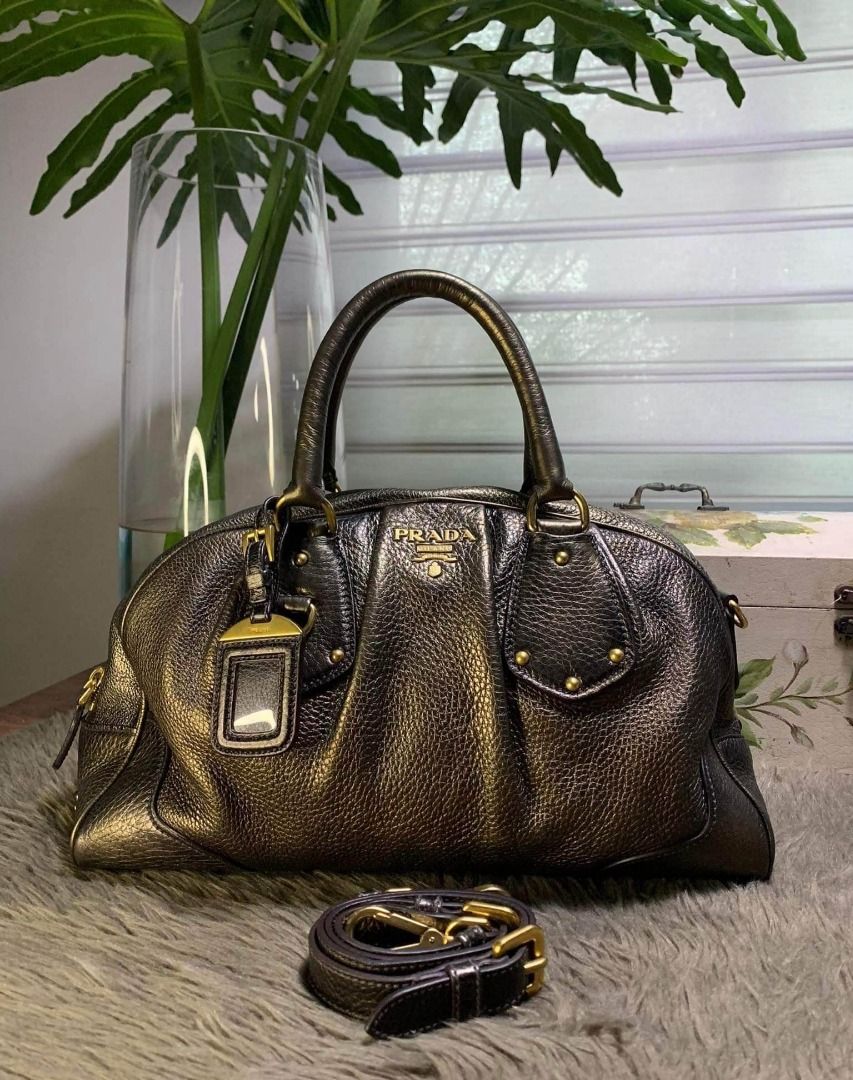 Prada Bauletto nappa leather (Category: Luxury Bags & Wallets) located in Las Pinas. Submitted by jvega08 (Listing ID 1210712730, Image 1). Description: selling authentic Prada Bauletto Nappa leather Color: Piombo Very good condition (No dustbag) 30000 only.
