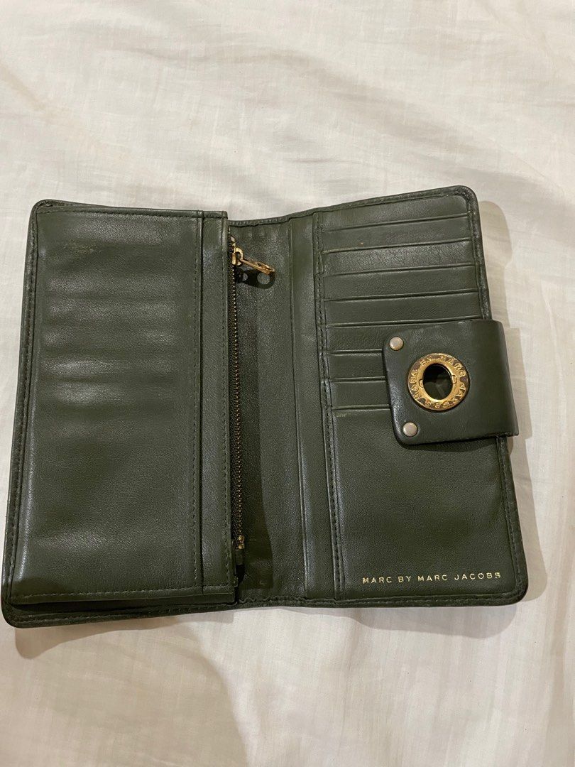 Preloved authentic branded wallets (Category: Luxury Bags & Wallets) located in Cebu City. Submitted by retiringshopaholic (Listing ID 1210763253, Image 2). Description: 1. Marc jacobs dark green wallet P1k 2. Tous silver brand new with dust bag P2k 3. Chloe beige P2k 4. Proenza schouler black P500 5. Plum Salvatore Ferragamo P3k 6. Black Salvatore Ferragamo P3k.