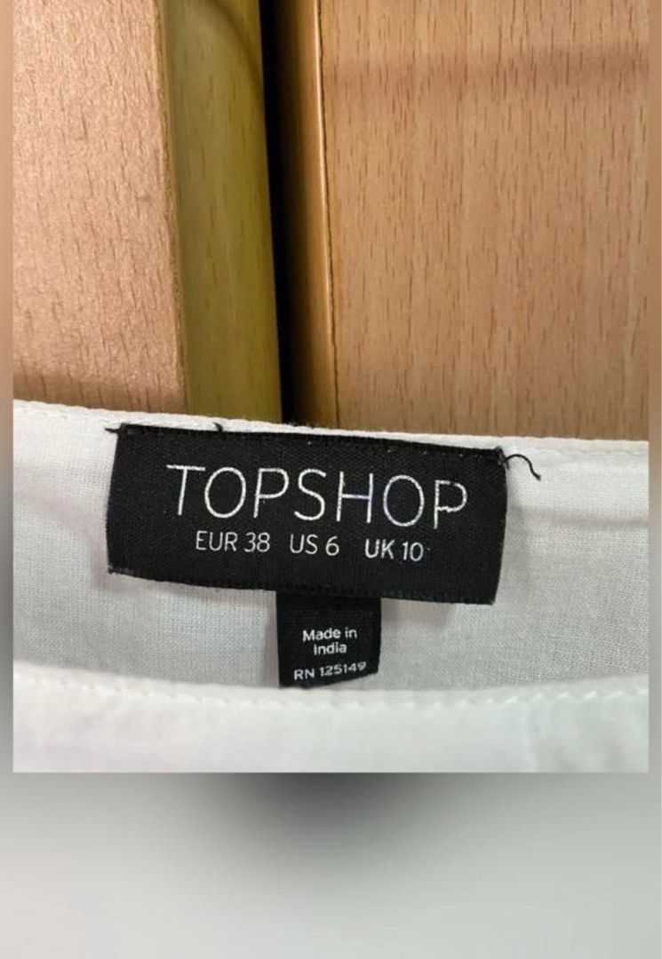 Topshop Cold Shoulder Dainty Top (Category: Blouses) located in Manila. Submitted by amiax (Listing ID 1210716347, Image 2). Description: Topshop Cold Shoulder blouse Size: Medium Used once only! Bought for 1500 before Super nice!.