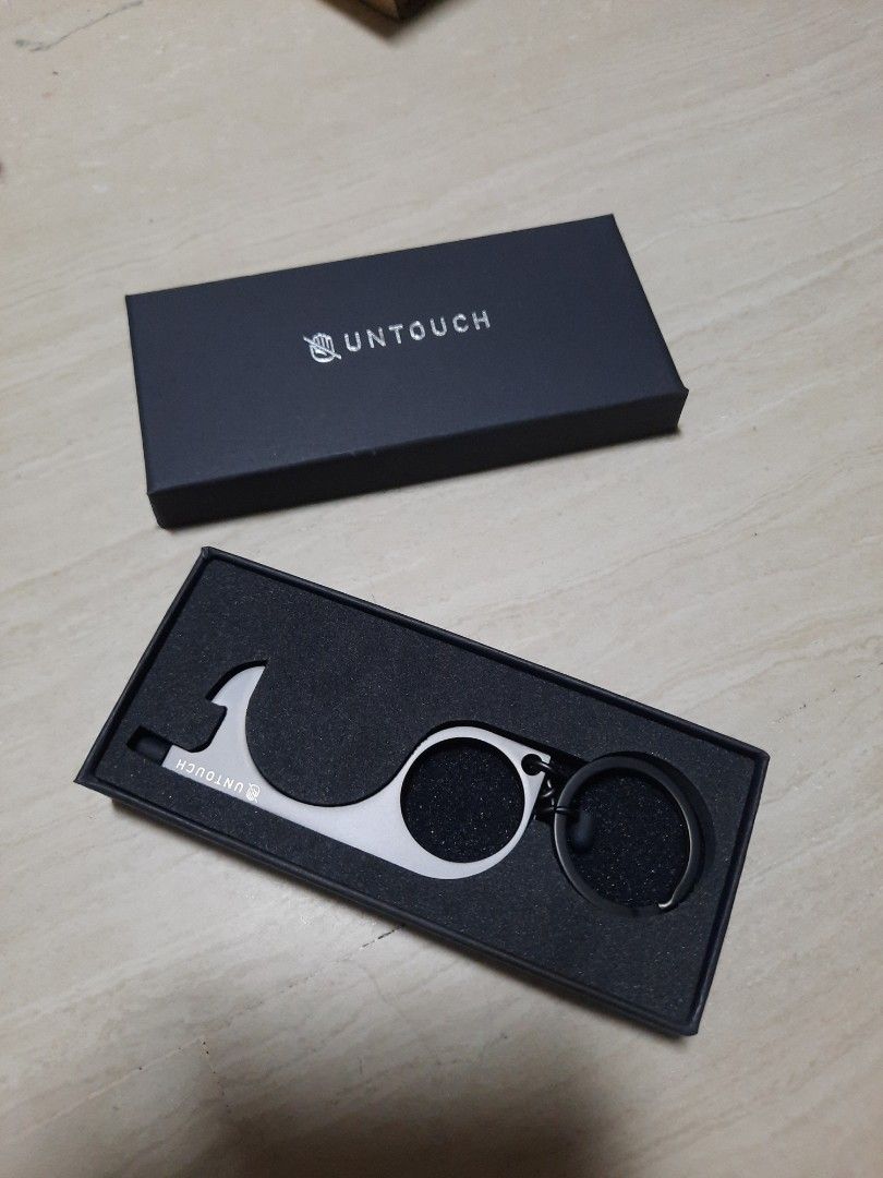 UNTOUCH Keychain (Category: Accessory holder, box & organizers) located in Singapore. Submitted by giraffehearts (Listing ID 1210698002, Image 1). Description: keychain with pointer for pressing lift buttons.