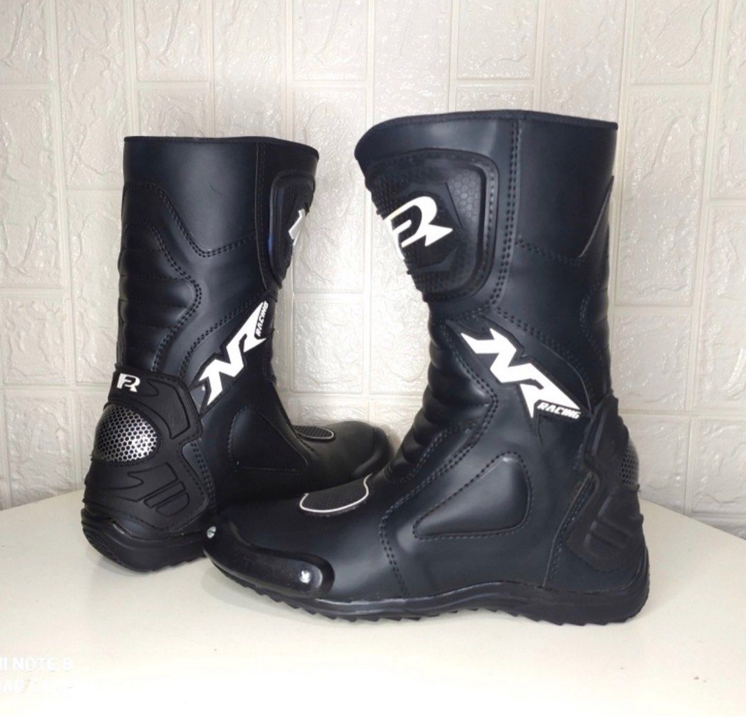 Biker riding midcut boots for drag race touring cornering