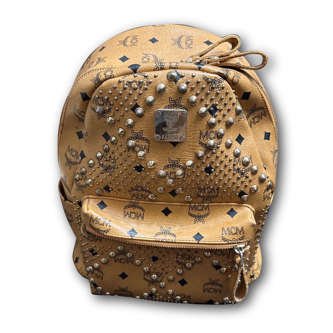 MCM Backpack Medium Size with Studs, Men's Fashion, Bags, Backpacks on  Carousell