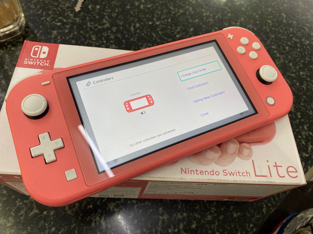 Nintendo Switch Lite (used), Video Gaming, Video Game Consoles, Nintendo on Carousell