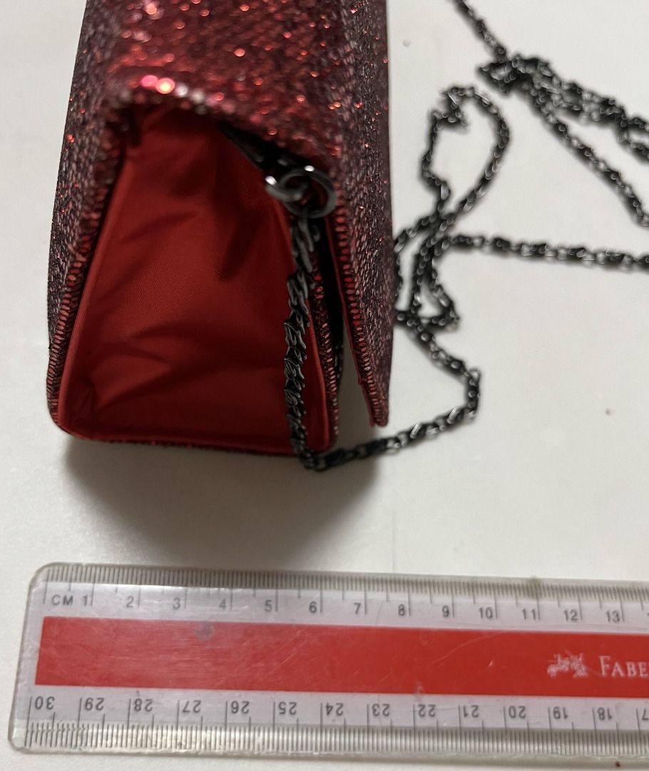 Red glitter clutch bag top