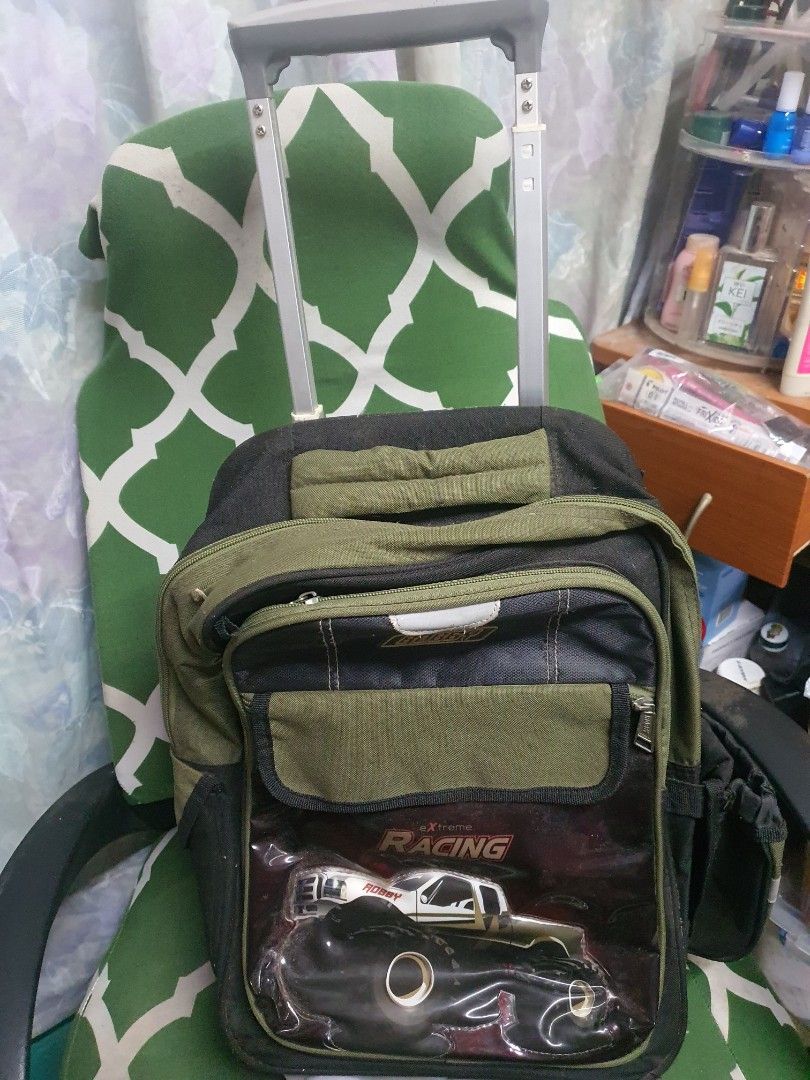 Trolley school bag (Category: Strollers) located in Antipolo. Submitted by bookaholicz_dettori (Listing ID 1210800925, Image 2). Description: Robby Rabbit trolley bag. With raincover, lunch bag, juicer and pencil case. Can send more pics if interested..