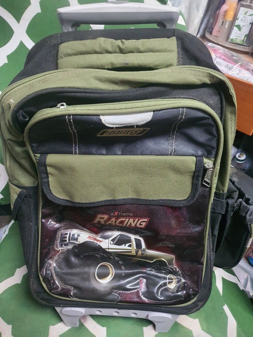 Trolley school bag (Category: Strollers) located in Antipolo. Submitted by bookaholicz_dettori (Listing ID 1210800925, Image 1). Description: Robby Rabbit trolley bag. With raincover, lunch bag, juicer and pencil case. Can send more pics if interested..