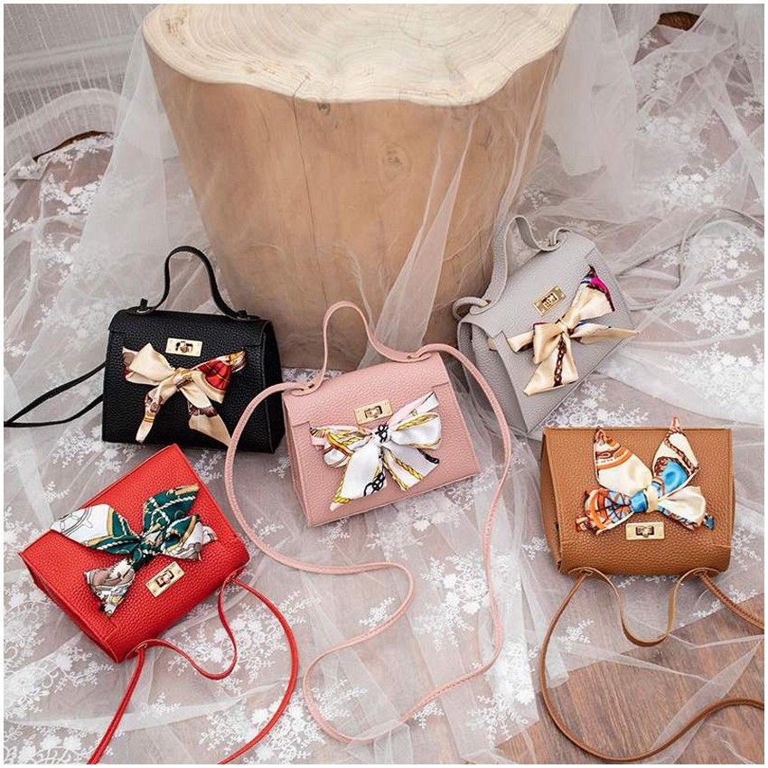 Fancy store sling bags