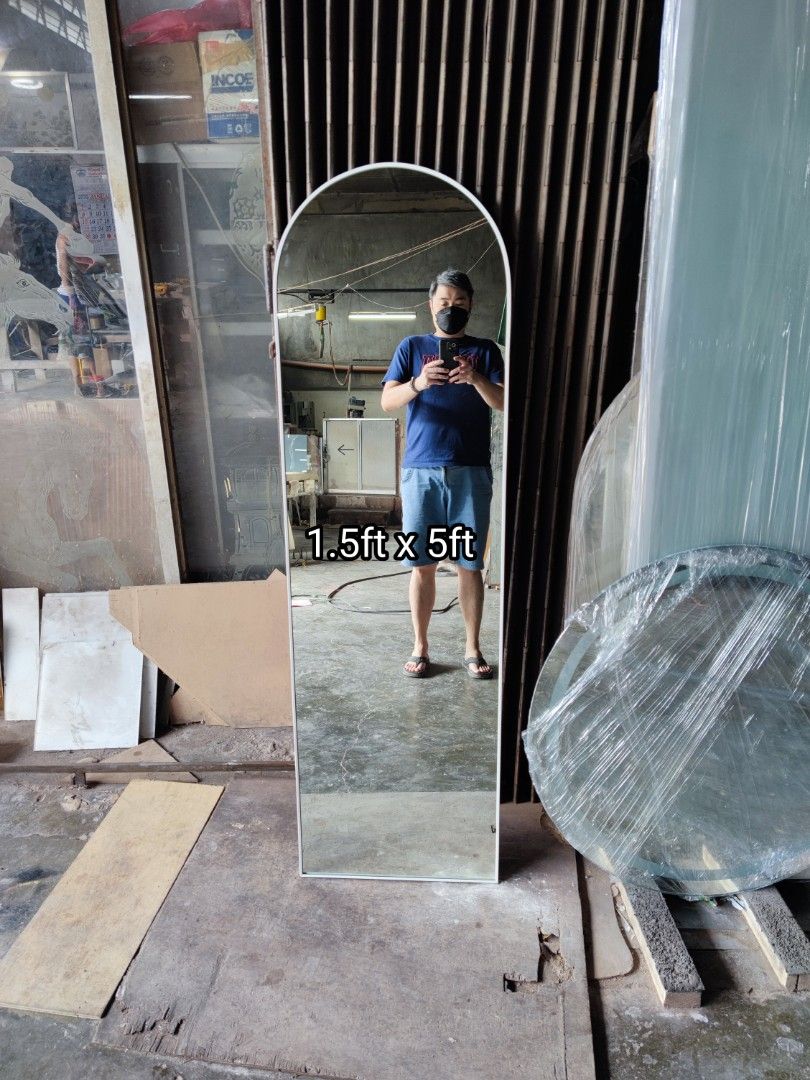 Arc Mirror framed (Category: Mirrors) located in Malabon City. Submitted by mirrors.ph (Listing ID 1210952050, Image 1). Description: Arc mirror with white aluminum frame and plywood backing. Using 6mm thick copper free mirror. Size: 1.5ft x 5ft P2025 Add P200 if with back hook. Available colors gold, glossy black, matte black, white and silver aluminum frame. Customize sizes and shapes are welcome..