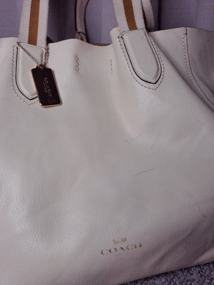 Coach Derby Striped Tote White (Category: Luxury Bags & Wallets) located in Plaridel. Submitted by joankatsev (Listing ID 1211049549, Image 3). Description: PRICE UPDATED Had color transfer from storage, will need color retouch too. Needs cleaning, re-stitching but still very useable condition. Please check pic for flaws..