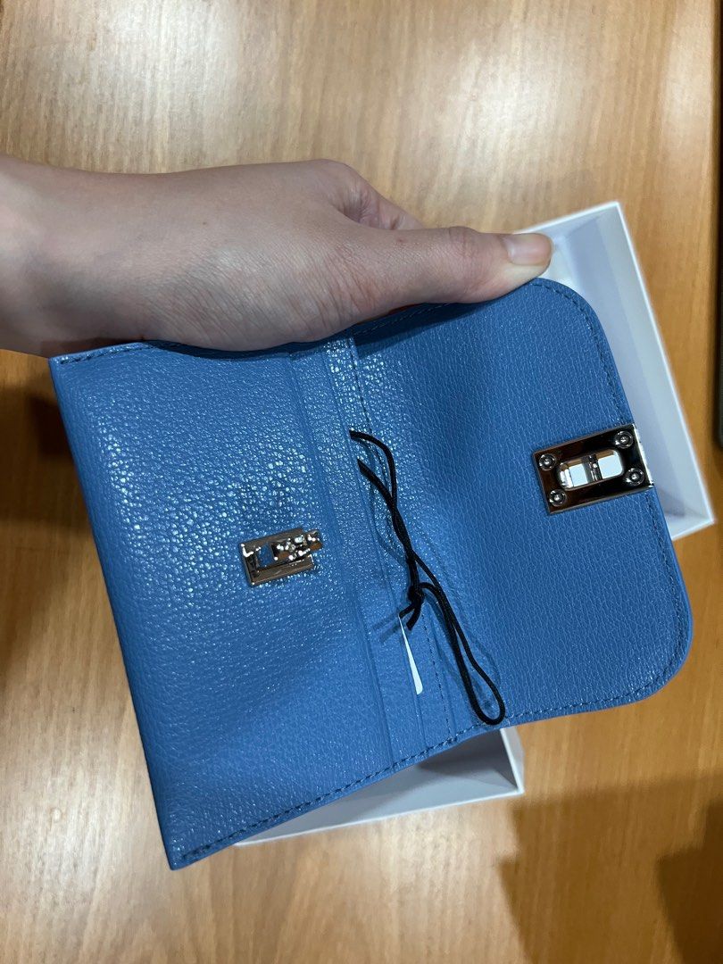 Authentic Furla Cardholder (Category: Luxury Bags & Wallets) located in Cebu City. Submitted by tala10 (Listing ID 1210927520, Image 3). Description: 🌸 SUMMER SALE, @ 4,500 instead of 6k 🌸 This is a brand new, unused Furla cardholder that I personally bought from Furla in New York back in June 2022. Guaranteed authentic. It has a unique clasp design and comes with a pocket at the back for keeping the most needed card accessible. The color is a 