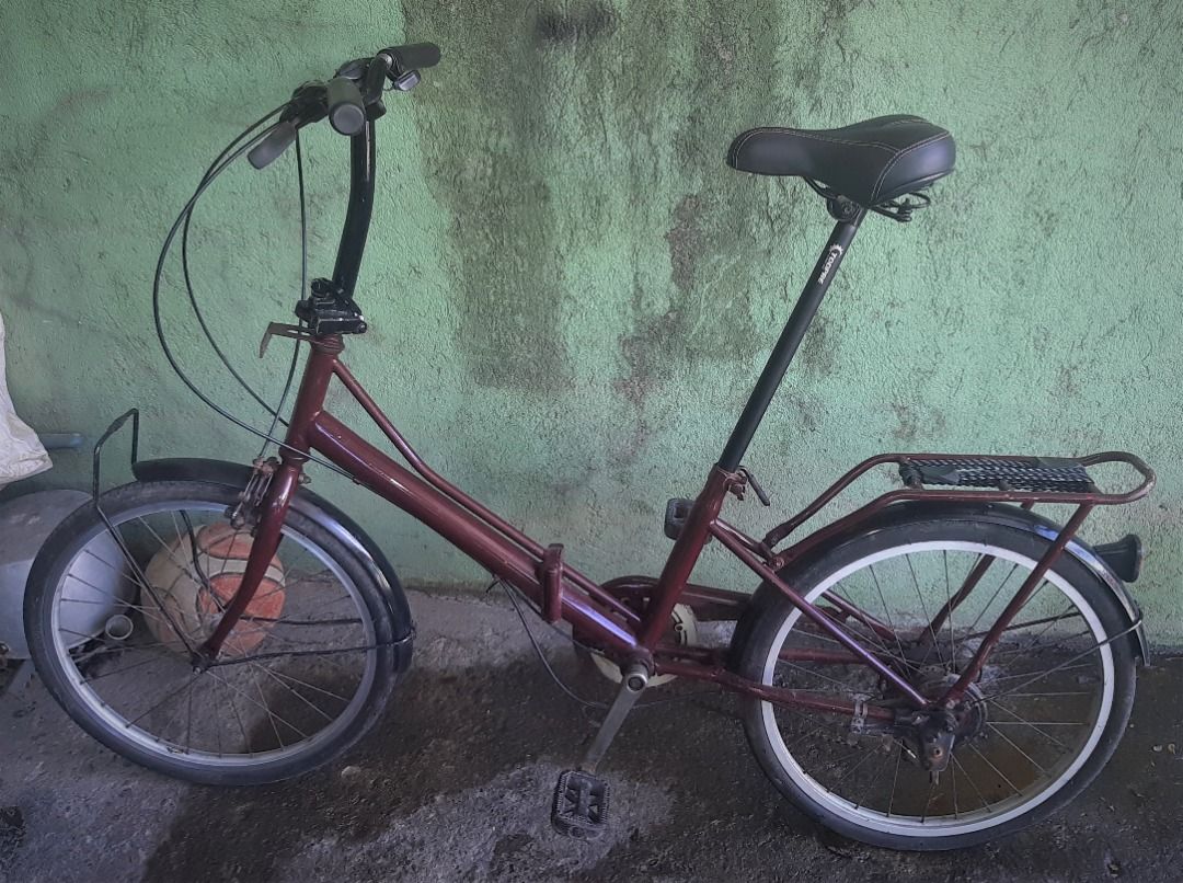 Folding bike (Japan original) (Category: Bicycles) located in Bacoor. Submitted by junzulueta (Listing ID 1207487550, Image 2). Description: Price: P3,000.00 Location: Salinas I Bacoor Original Japan Folding Bike Specs: - 6 speed - Size 20 tires (Almost new ) - wide suspension saddle (very comfortable) - Rear carrier - Front basket brace (basket not included) - 450mm seat post (Brand new) - Shimano combo brake & shifter lever - All cables brand n
