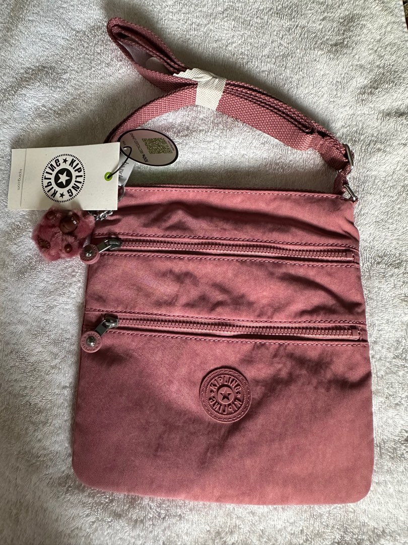 Kipling cross body bag/sling bag, Women's Fashion, Bags & Wallets, Crossbody Bags on Carousell