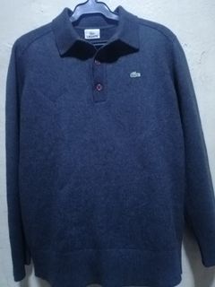 Lacoste knitted long sleeve  size 5 on tag. 21x26. 5. excellent condition. noruns and lints.