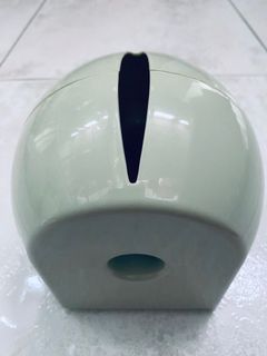 Toilet roll holder for toilet training