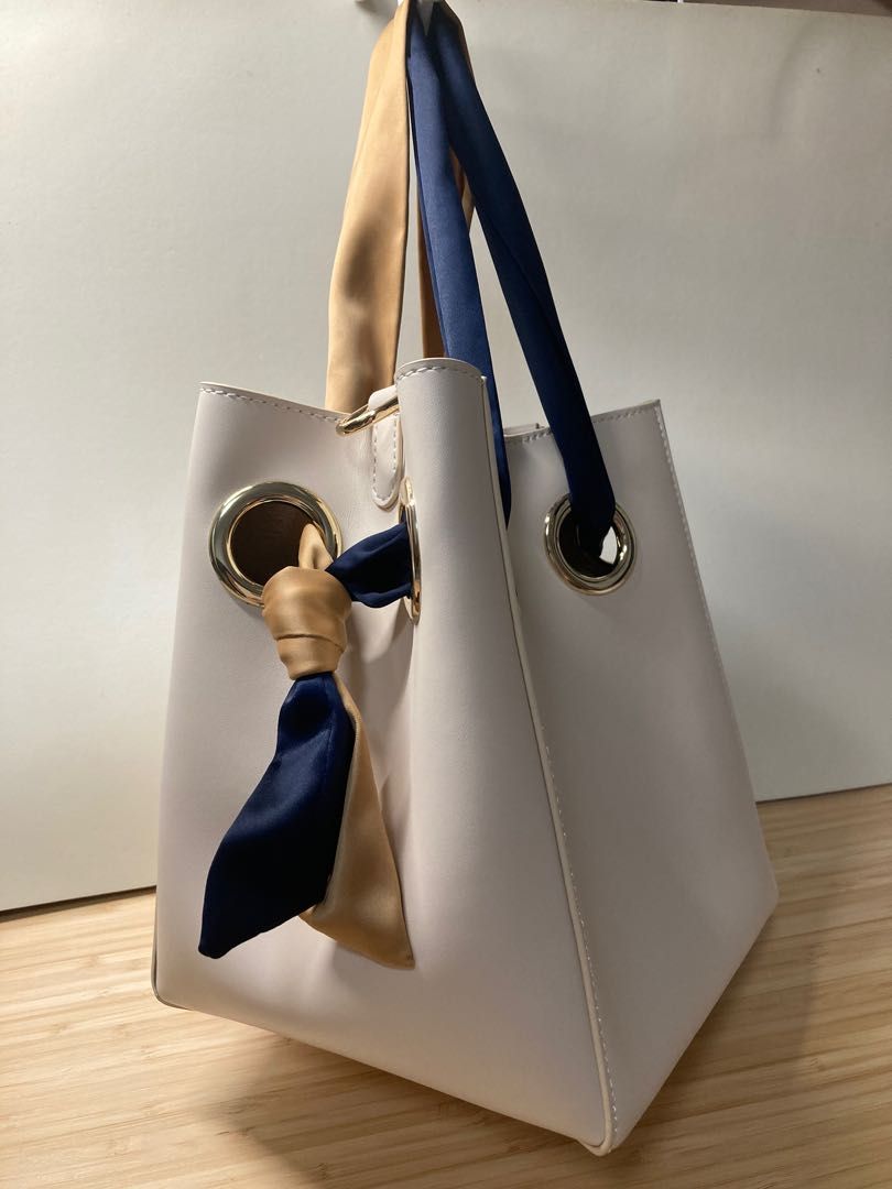 Ribbon handle deals bucket bag