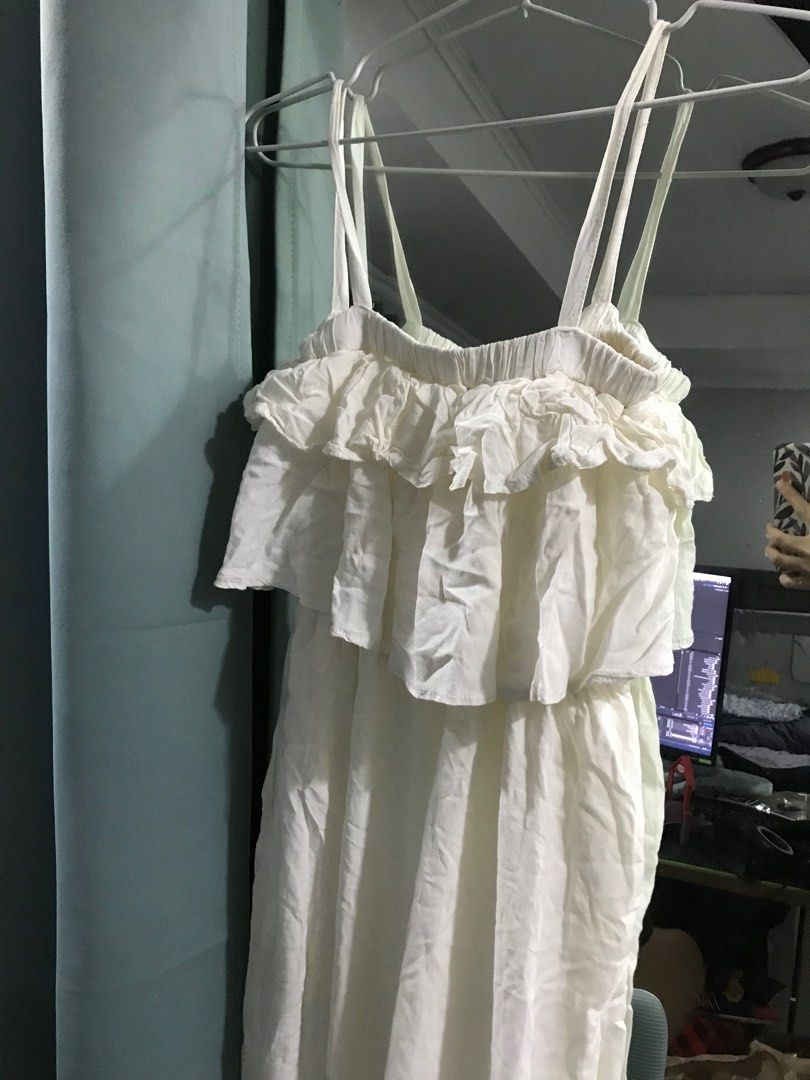 White jumpsuit (Category: Jumpsuits) located in Cagayan de Oro. Submitted by declutterwithstef (Listing ID 1211162603, Image 2). Description: Never been used jumpsuit. Was supposed to use it for a trip but forgot to pack it lmao.