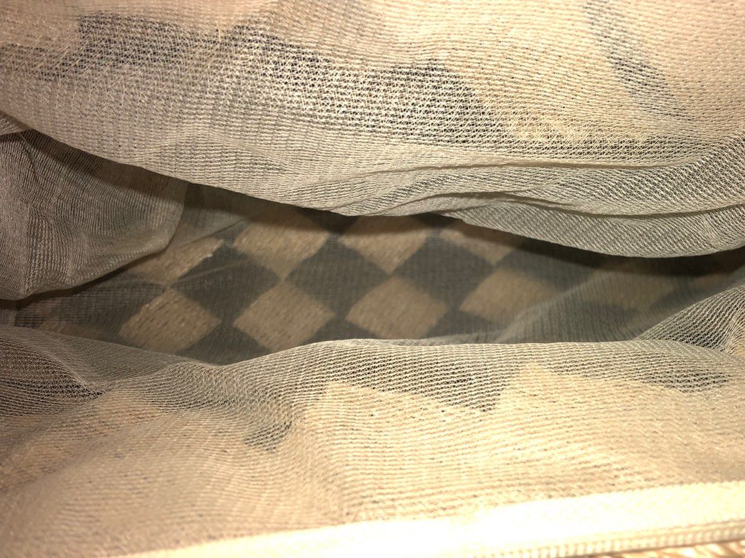Wooden-Handle Knitted Handbag (Category: Beach Bags) located in Manila. Submitted by cee.things (Listing ID 1211084006, Image 2). Description: This wooden-handle knotted bag is perfect for your errands! The handle is sewed so strong and the bag is spacious inside (mesh material) so it's safe for you to store your material girl stuff! You can even place your umbrella inside! RFS: I need funds ☹️🤗 •Price is still negotiable for sure-buyers!.