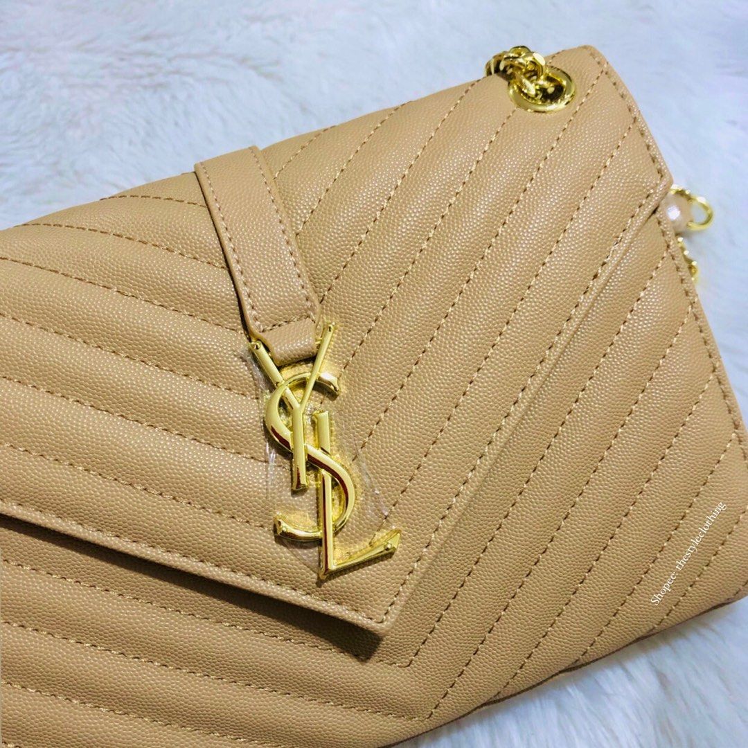 Ysl beige envelope, Luxury, Bags & Wallets on Carousell