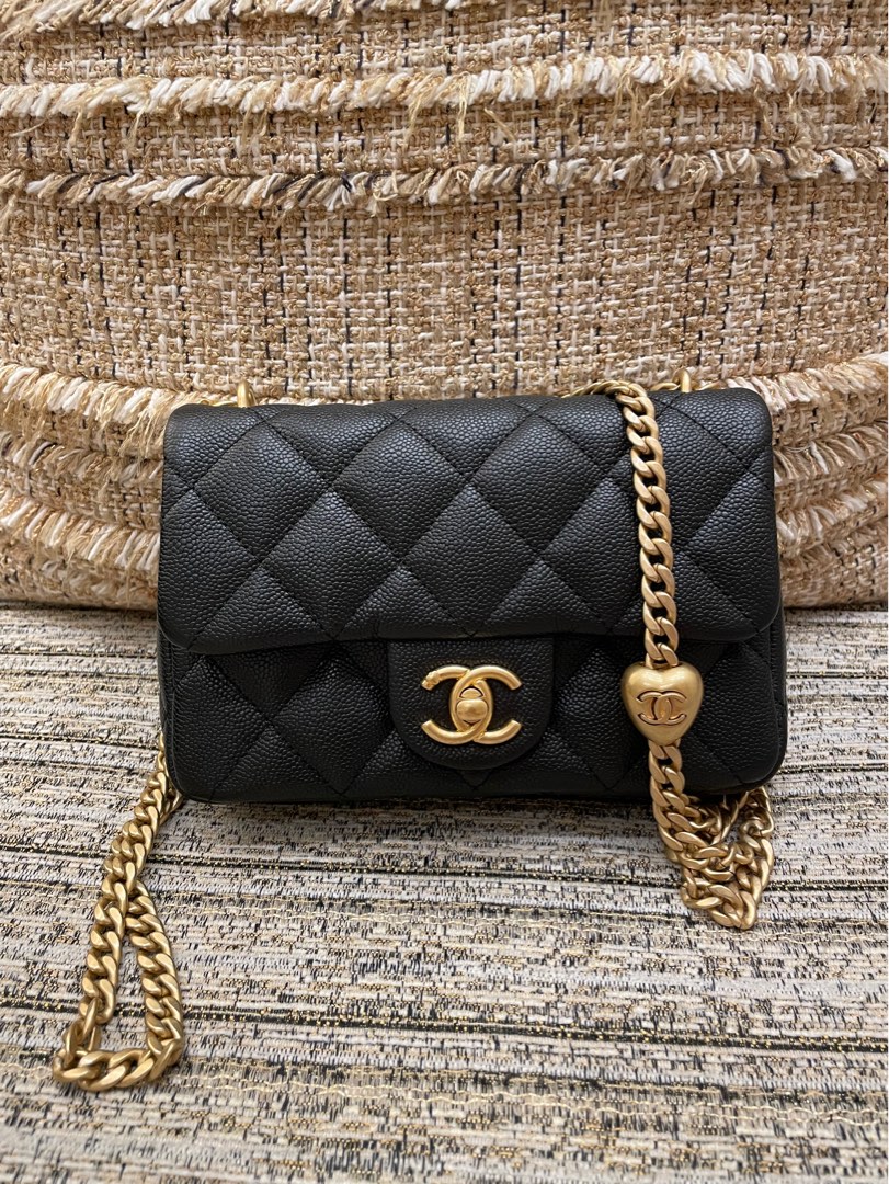 Chanel 23p black caviar mini flap black adjustable strap with heart Pearl  crush, Luxury, Bags & Wallets on Carousell