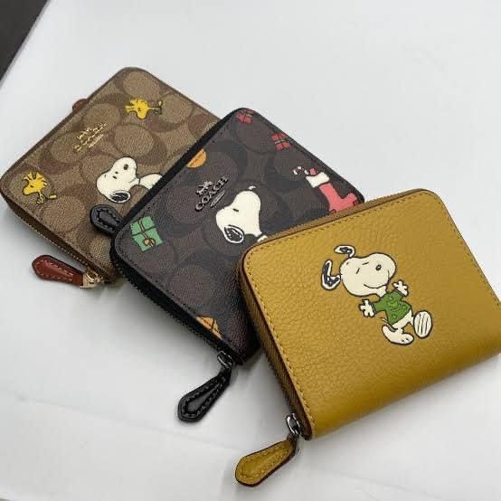 Coach x peanuts / wallet (Category: Luxury Bags & Wallets) located in Las Pinas. Submitted by yhn_boutique (Listing ID 1211248491, Image 1). Description: Complete inclusions Cod via lalamove Shipping J&T/lbc DM .