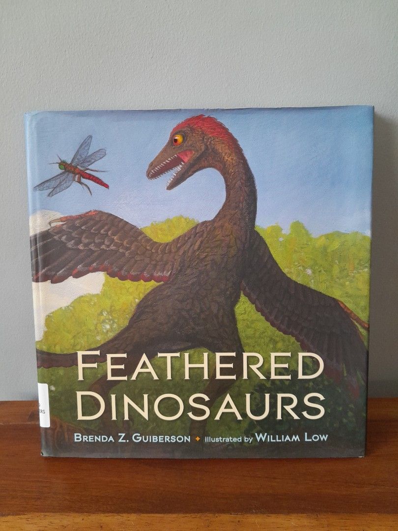 Feathered Dinosaurs (Category: Children's Books) located in Pasig City. Submitted by three.babybears (Listing ID 1211210513, Image 1). Description: Hardcover book with dust jacket first page and last page were taped (please see last 2 photos).