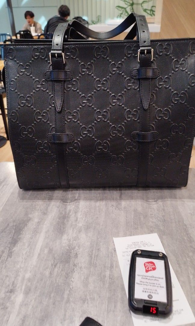 Gg embossed online tote bag