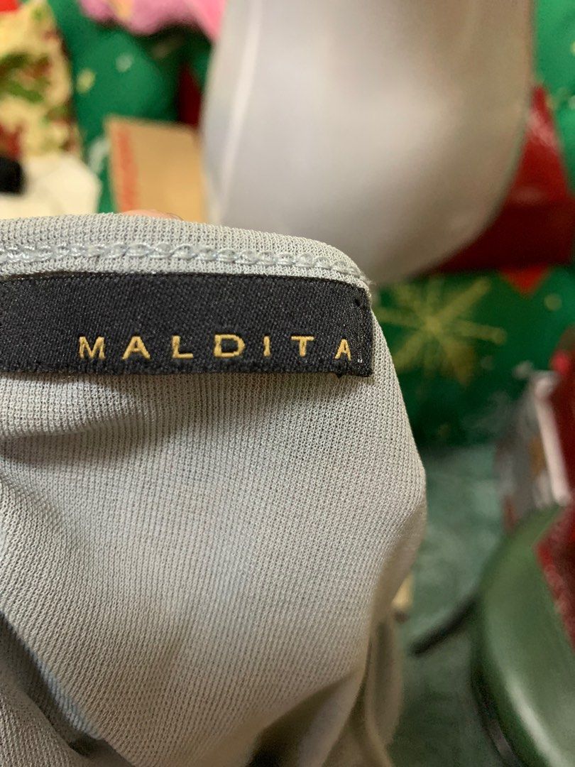 Maldita Blouse (Category: Blouses) located in Pasig City. Submitted by gracious2021 (Listing ID 1211340120, Image 2). Description: Personal Pre❤️ for decluttering Very good condition, no flaws.